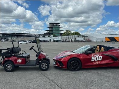 Elliott’s golf carts alongside the Indy 500 Corvette pace car at IMS