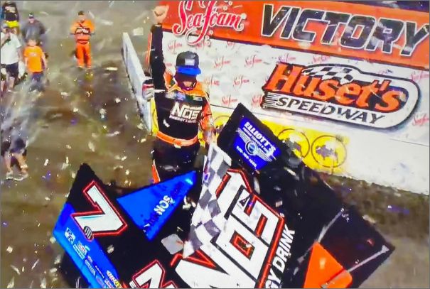 Tyler Courtney’s NOS Energy sprint car celebrating in victory lane at Huset’s Speedway