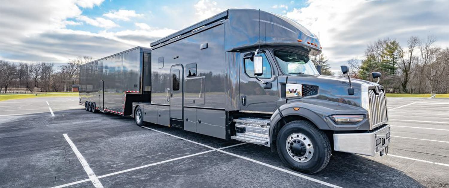 Bolt toterhome towing a race trailer